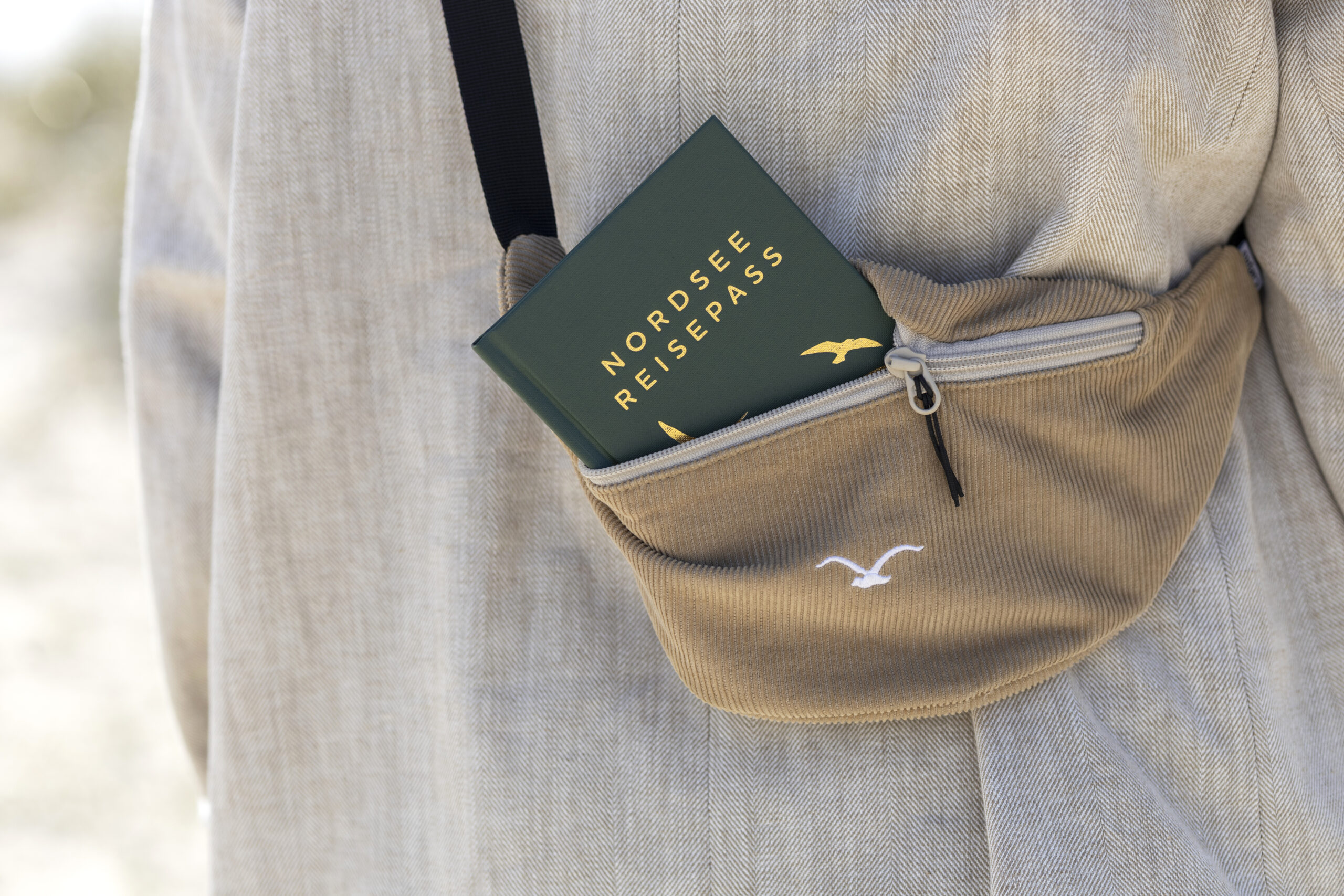 Nordsee-Reisepass in der Handtasche dabei